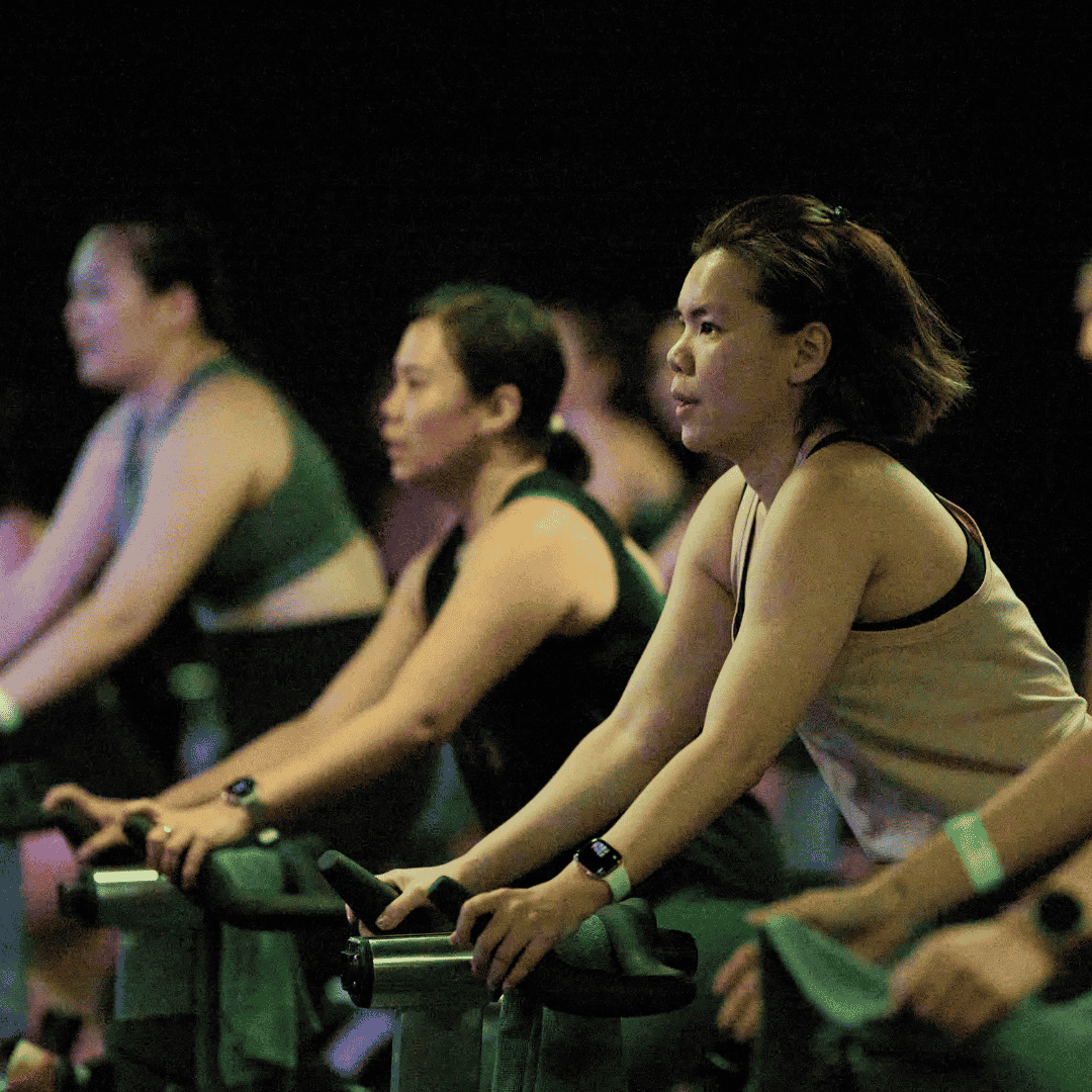 Riders in spin class at SALT Fitness Singapore